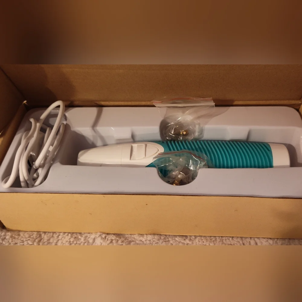 White and Teal Hair Clipper